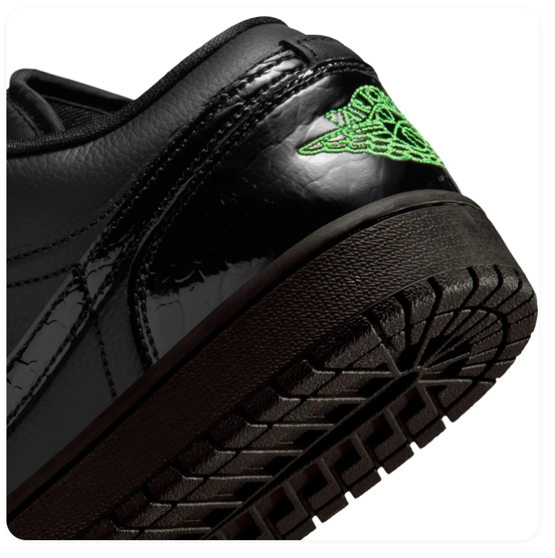 Air Jordan 1 Low Black Sneakers with Green Accents