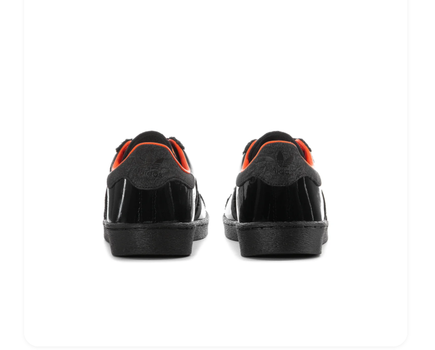 adidas Black Glossy Low-Top Sneakers with Orange Accents
