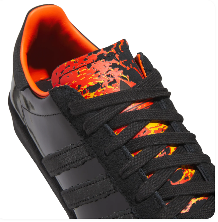 adidas Black Glossy Low-Top Sneakers with Orange Accents